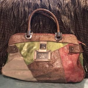 Guess bag 15”l 8.5”h 4”width